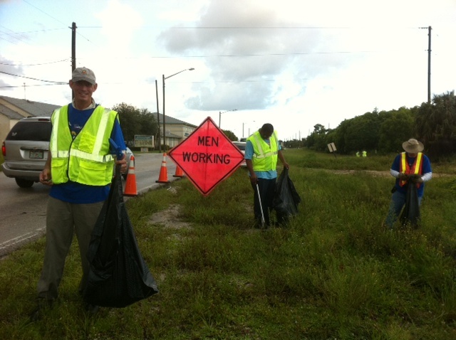 Mayor James DuBois volunteers along with Town employees to keep Lake Park beautiful